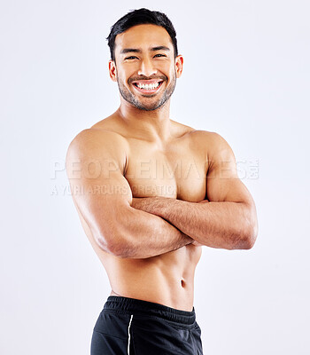 Buy stock photo Happy asian man, portrait and muscular body with confidence for workout routine on a white studio background. Male person or bodybuilder with smile or arms crossed in fitness, exercise or weight loss