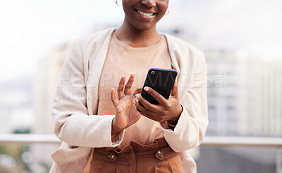 Buy stock photo Cropped shot of an unrecognisable businesswoman standing alone on the balcony outside and using her cellphone