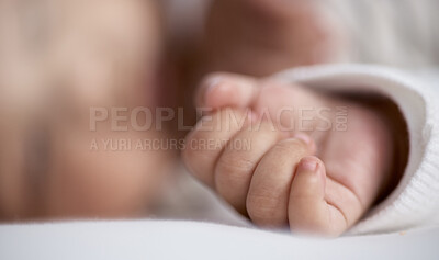 Buy stock photo Closeup shot of a baby's hand while asleep at home