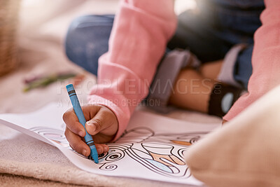 Buy stock photo Shot of an unrecognizable girl drawing on a piece of paper at home