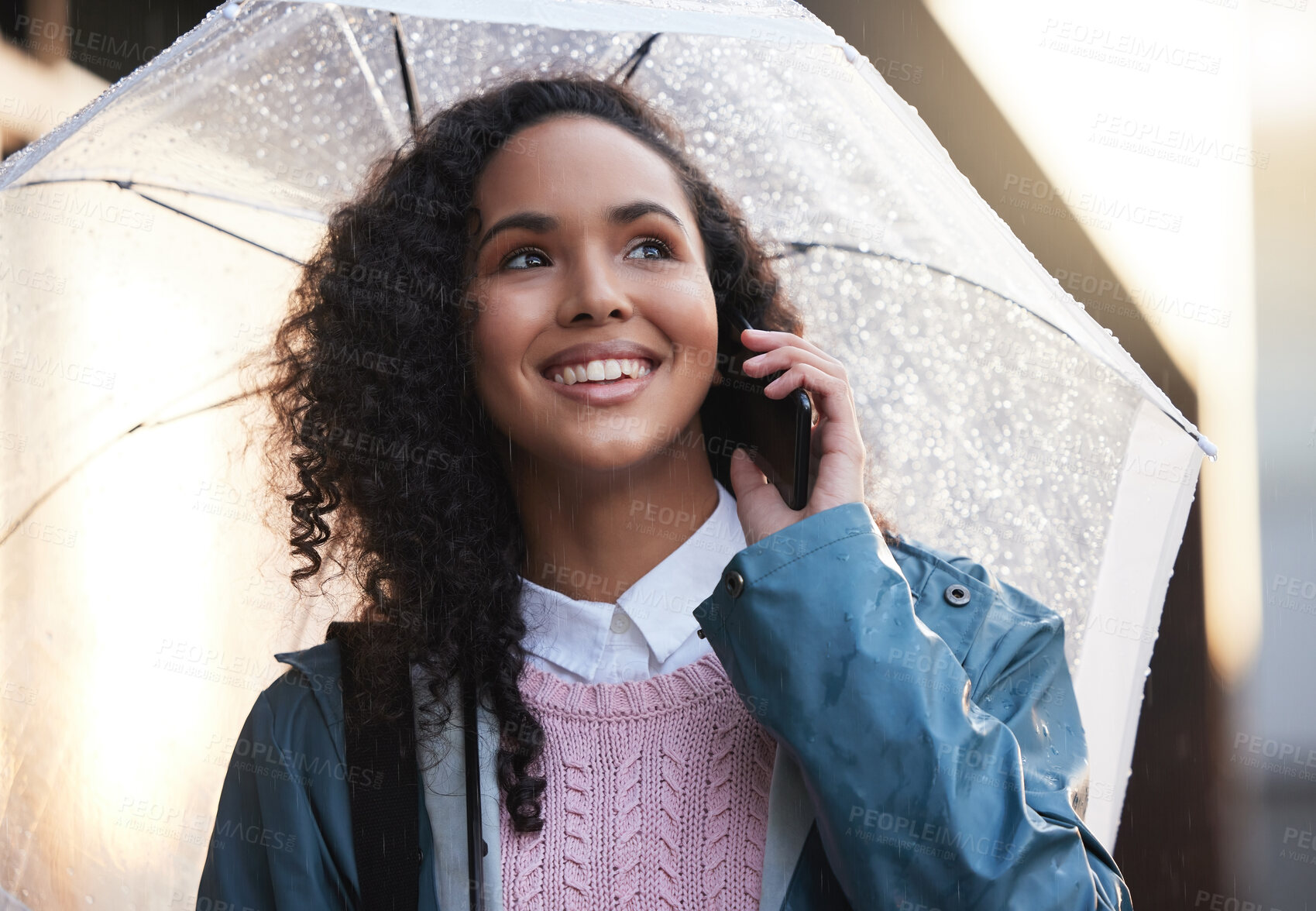 Buy stock photo Phone call, business and woman with umbrella for communication, networking and morning travel in city. Female employee, mobile and cover for winter rain with urban commute, work update and discussion