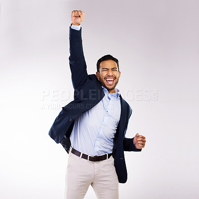 Buy stock photo Studio shot of a handsome young man cheering against a grey background