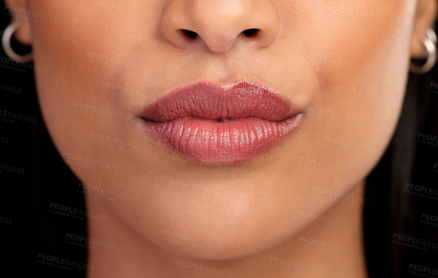 Buy stock photo Woman, mouth and lipgloss for beauty in studio, textures and skincare on black background. Female person, lips and shine for filler or dermatology, treatment and skin textures for grooming or glow