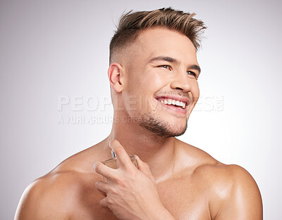 Buy stock photo Thinking, man and perfume in studio for health, cleaning and wellness or body care. Male person, cologne and spray for hygiene in bathroom with pride, cosmetics and aesthetics by white background 