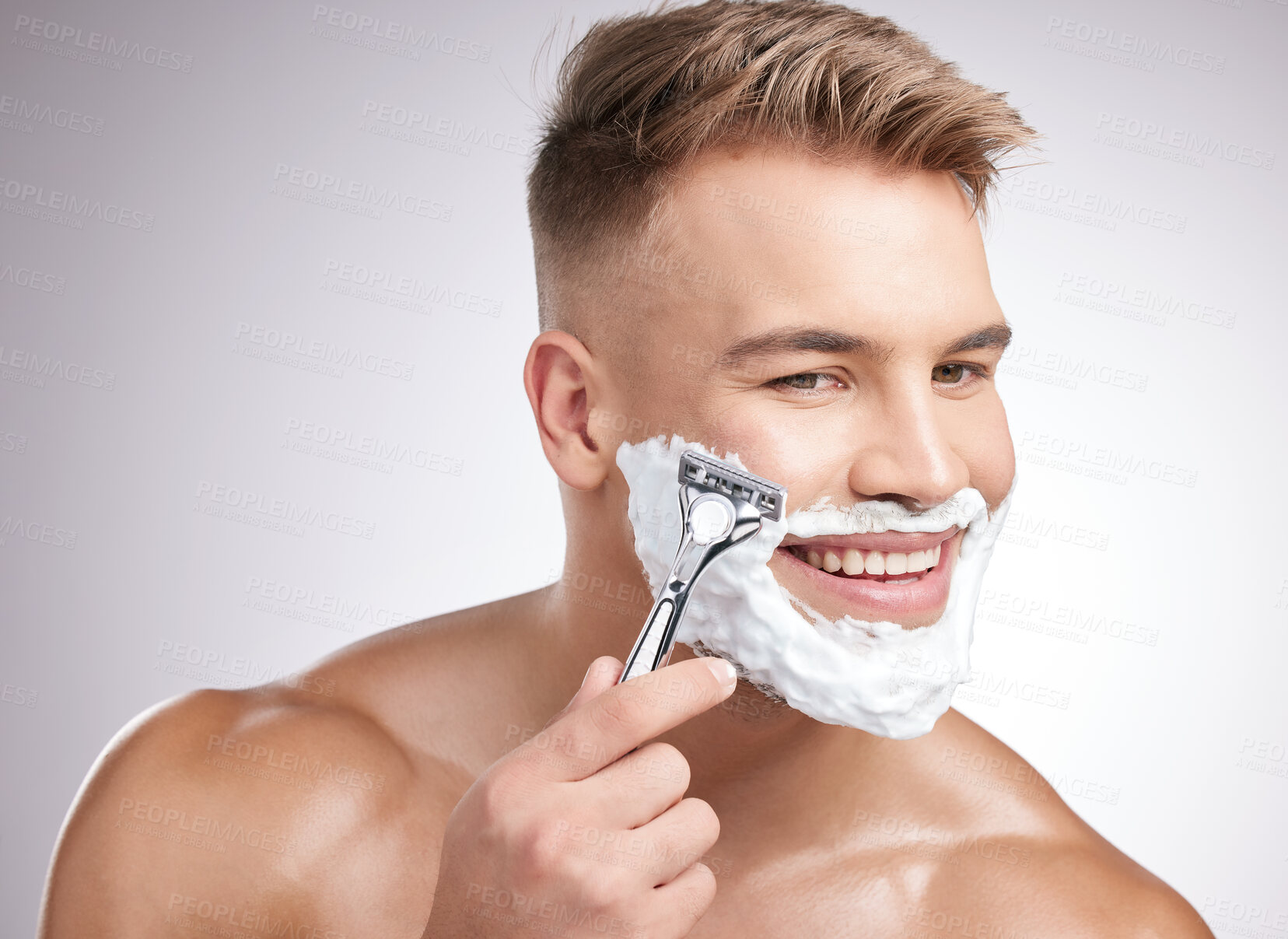 Buy stock photo Man, happy and shaving cream with razor in studio, grooming and facial care for beard hair removal with product. Foam, skincare and dermatology or cosmetology, cleaning hygiene and white background