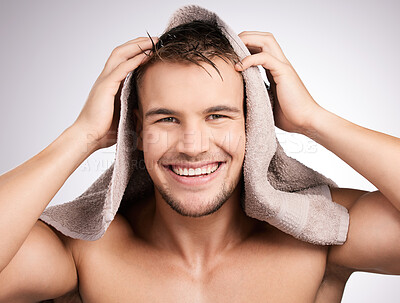 Buy stock photo Studio, towel and man in portrait for haircare, collagen and cosmetic after shower with confidence. White background, male model and fabric for freshness, hygiene and healthy routine as treatment