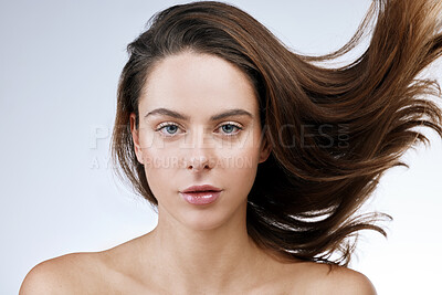 Buy stock photo Hair care, woman or portrait and beauty in studio with breeze, collagen treatment or brazilian for shine. Person, makeup and cosmetics with dermatology and keratin with white background for wellness