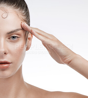 Buy stock photo Portrait, woman and face with closeup in studio on white background for beauty mock up. Female model, salute and serious expression for self care, edges and treatment for health, glow and texture