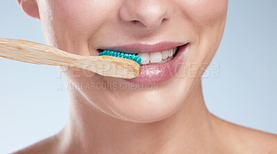 Buy stock photo Mouth, beauty and woman in studio with toothbrush, hygiene and dental care on white background. Toothpaste, product and closeup for influencer and brand deal, medical and promotion for female person