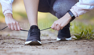 Buy stock photo Woman, tie laces and fitness in nature, getting ready and prepare for exercise or workout on ground. Female person, foot and fasten sneakers for sports training, running shoes and athlete for cardio