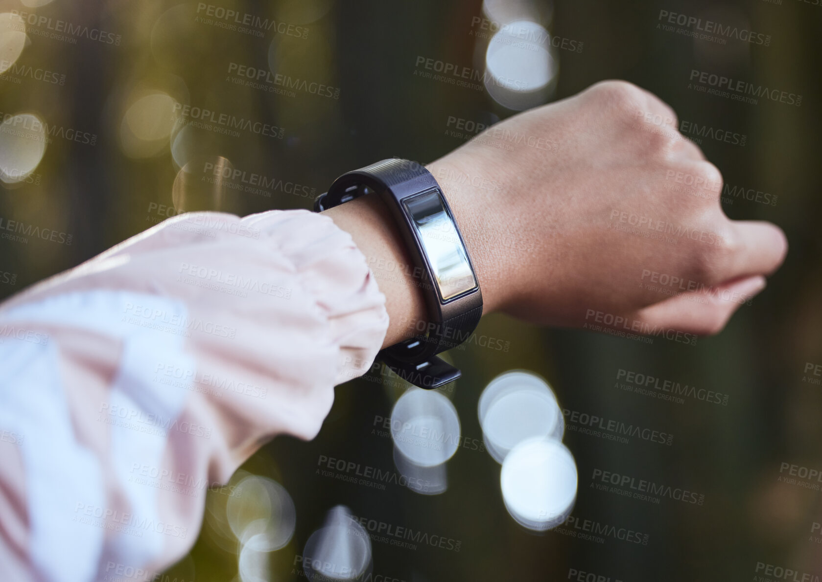 Buy stock photo Shot of an unrecognisable woman wearing a fitness watch