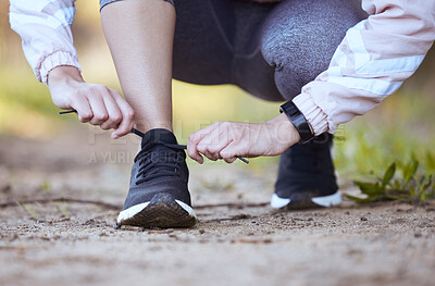 Buy stock photo Woman, tie laces and fitness in outdoor, getting ready and prepare for exercise or workout on ground. Female person, feet and fasten sneakers for training in nature, running shoes and athlete for jog