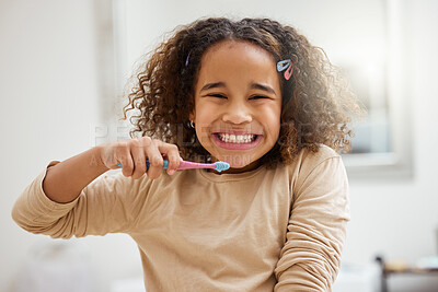 Buy stock photo Portrait smile, child and brushing teeth in bathroom for hygiene with gum health, morning and fresh breath. African girl, happy and toothbrush for cleaning with learning routine, dental or mouth care