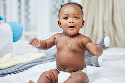 Buy stock photo Portrait, African and newborn baby in clinic for care, growth development and health assessment. Happy patient, smile or girl on bed in hospital ready for infant exam, pediatric treatment or wellness