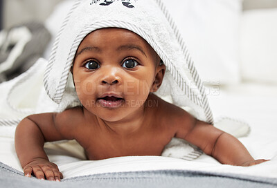 Buy stock photo Shot of an adorable baby boy wearing a hoody towel