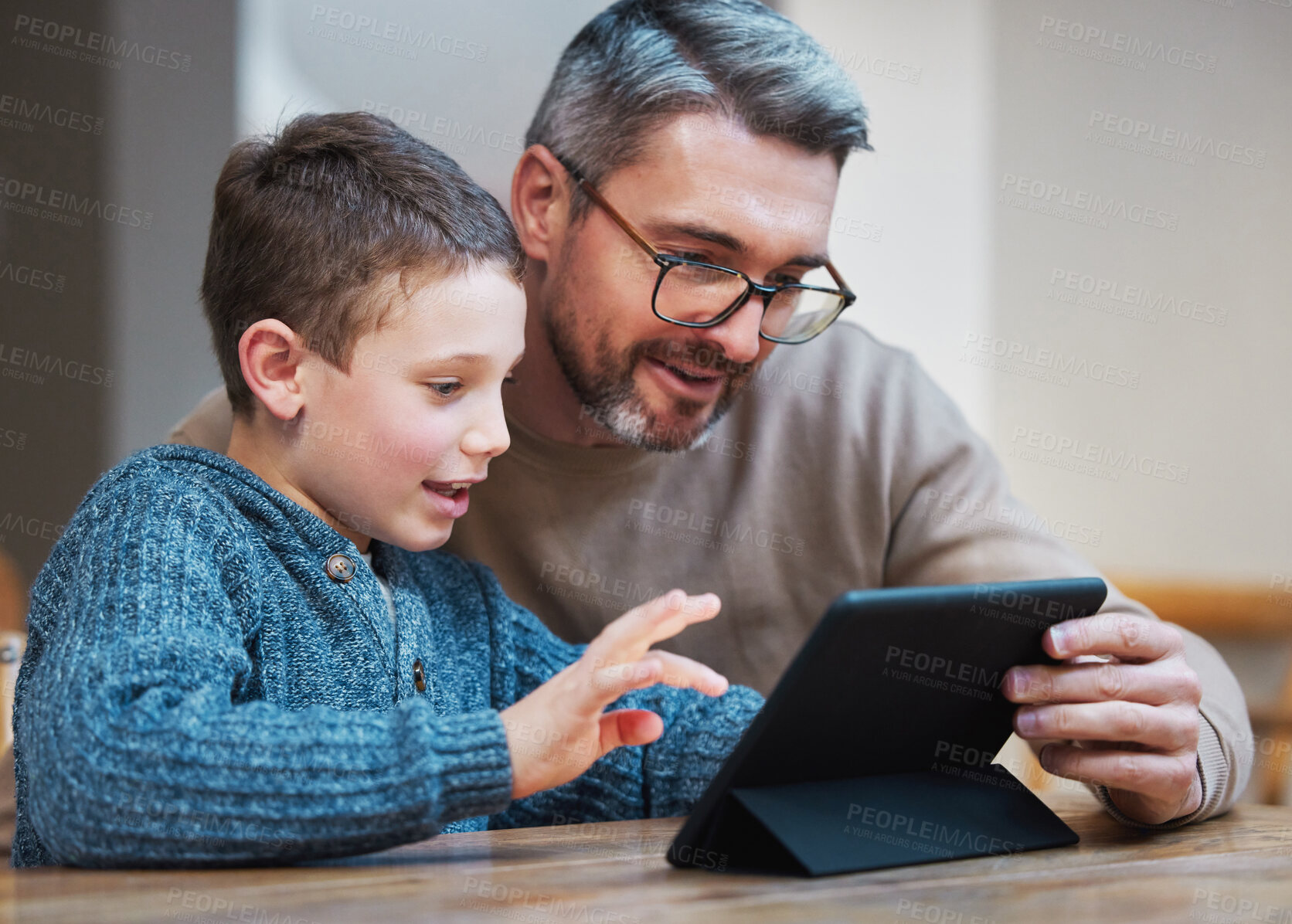 Buy stock photo Tablet, learning and dad with child in home for online classes, school project and lesson. Family, education and father teaching boy on digital tech for help with studying, homework and assignment