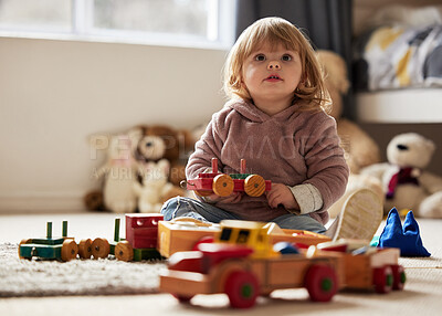 Buy stock photo Shot of a little girl playing at home