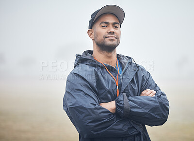 Buy stock photo Shot of a young coach on the field