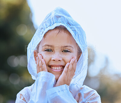 Buy stock photo Shot of a little girl having fun in the rain