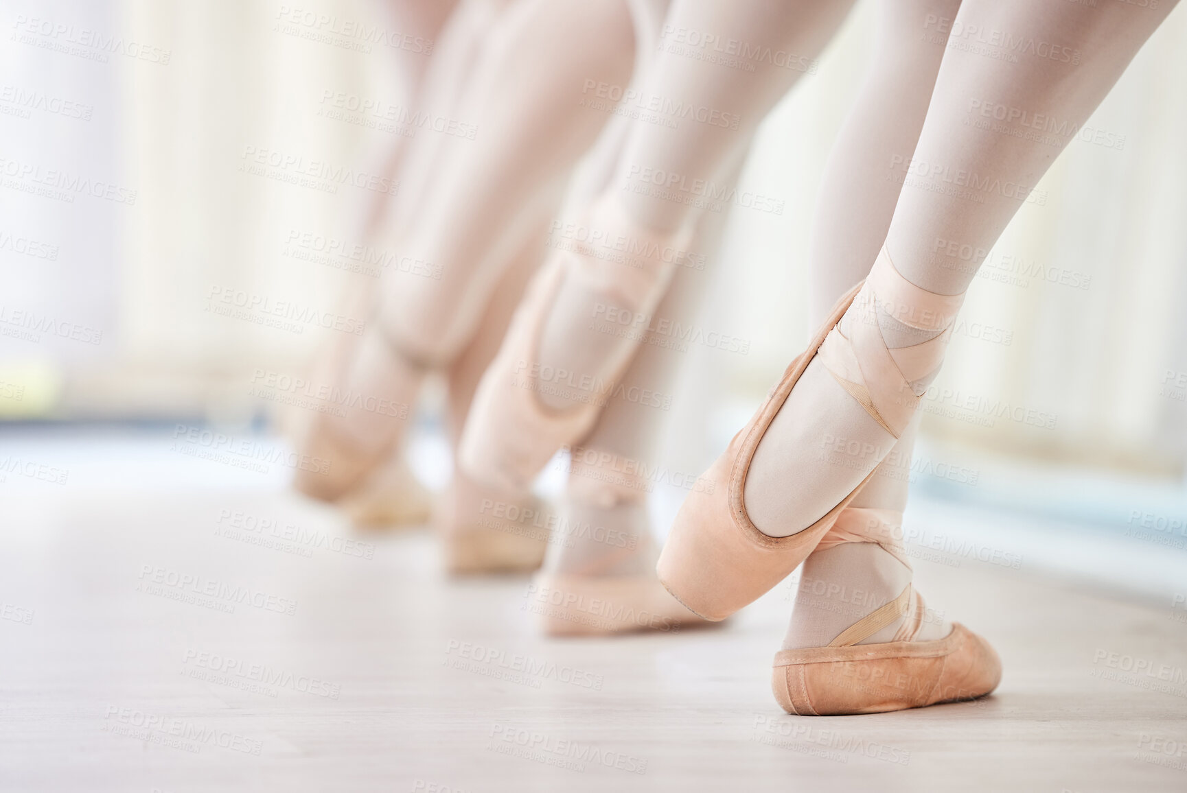 Buy stock photo Shot of a group of ballet dancers during their rehearsal