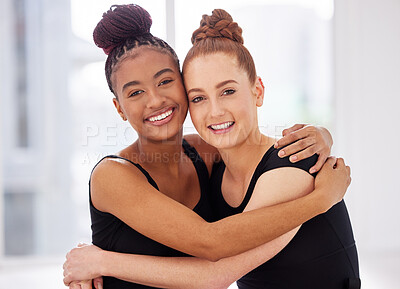 Buy stock photo Shot of two ballet dancers hugging