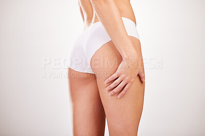 Buy stock photo Woman, underwear and butt in studio for skincare lift, plastic surgery and white background. Female person, back and smooth hair removal treatment for dermatology, glutes and bum implant for beauty