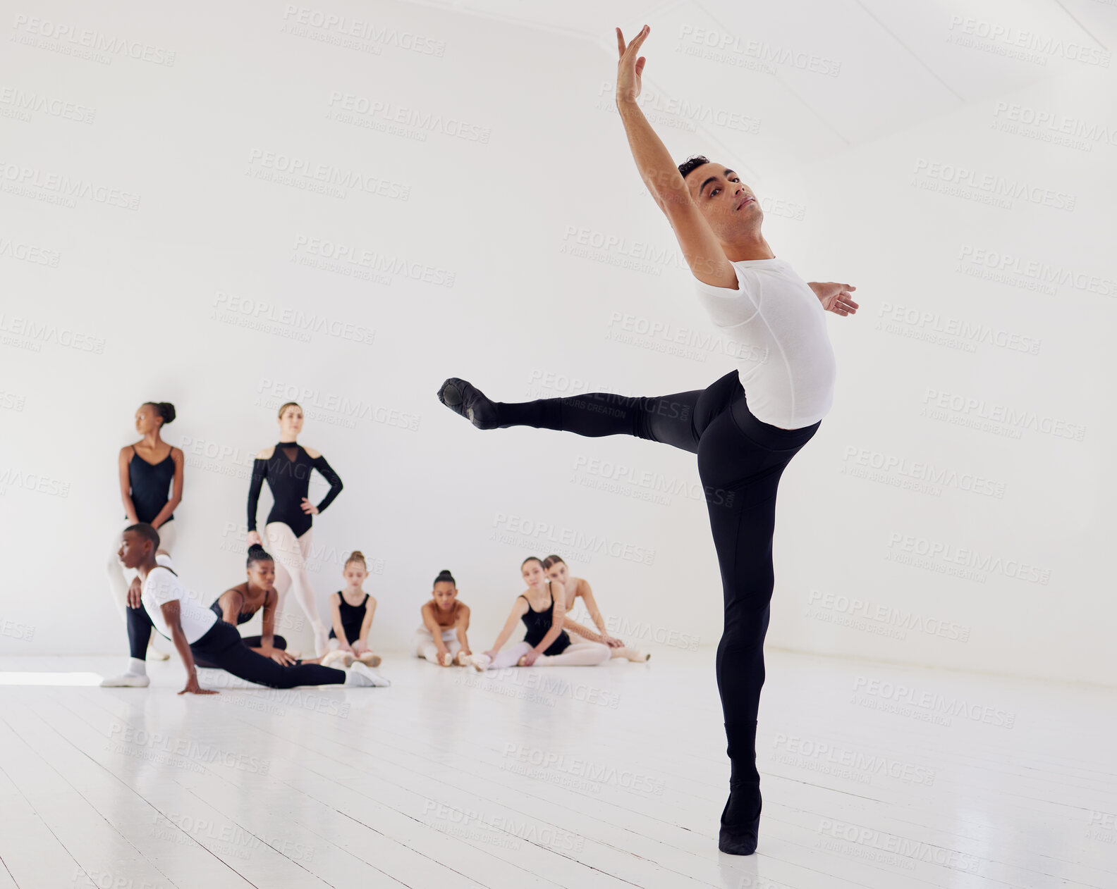 Buy stock photo Man, group and ballet training, stretching and creativity in a studio, performance routine and fitness. Young people, team and male dancer with energy, creativity and talent with professional dancers