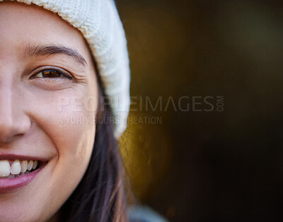 Buy stock photo Cropped shot of an attractive young woman standing alone outside