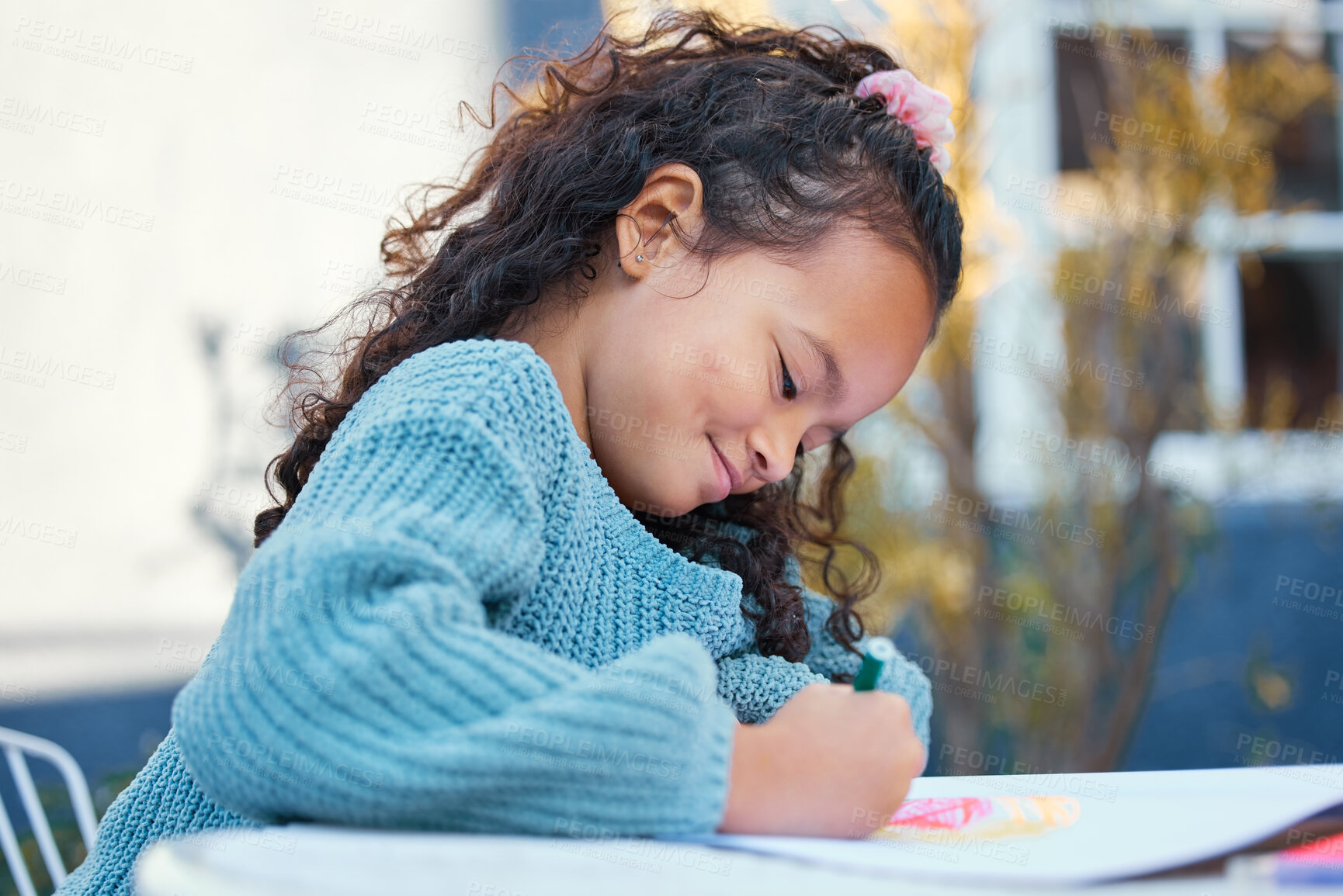 Buy stock photo Girl child, happy and homework in outdoor garden for learning with book, development and drawing in home. Young kid, education and smile for art project, color pencil and growth with creative talent