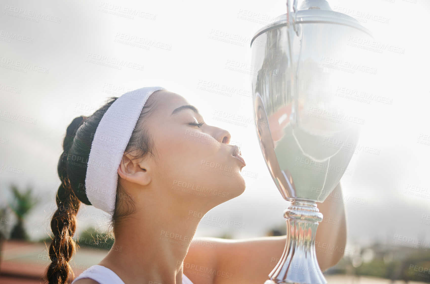 Buy stock photo Trophy, kiss and woman on court for success, fitness and competition or performance for game. Athlete, achievement and celebration for winning in sports club with exercise, workout and wellness 