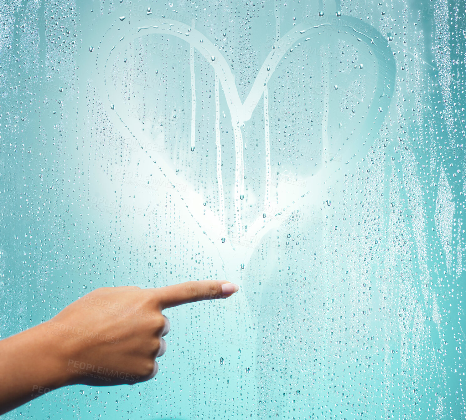 Buy stock photo Shot of a heart on a glass surface against a blue background