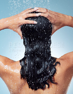 Buy stock photo Shot of an unrecognisable woman washing her hair during her morning shower