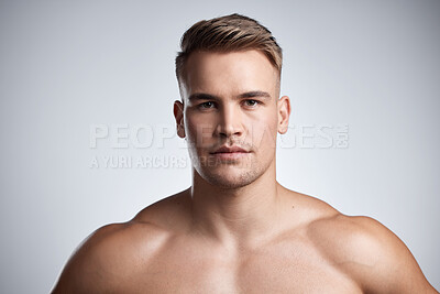 Buy stock photo Portrait, serious fitness and strong man on studio, background and backdrop for power, athletic confidence and athlete. Face, muscular bodybuilder and topless male model with muscles for sports pride