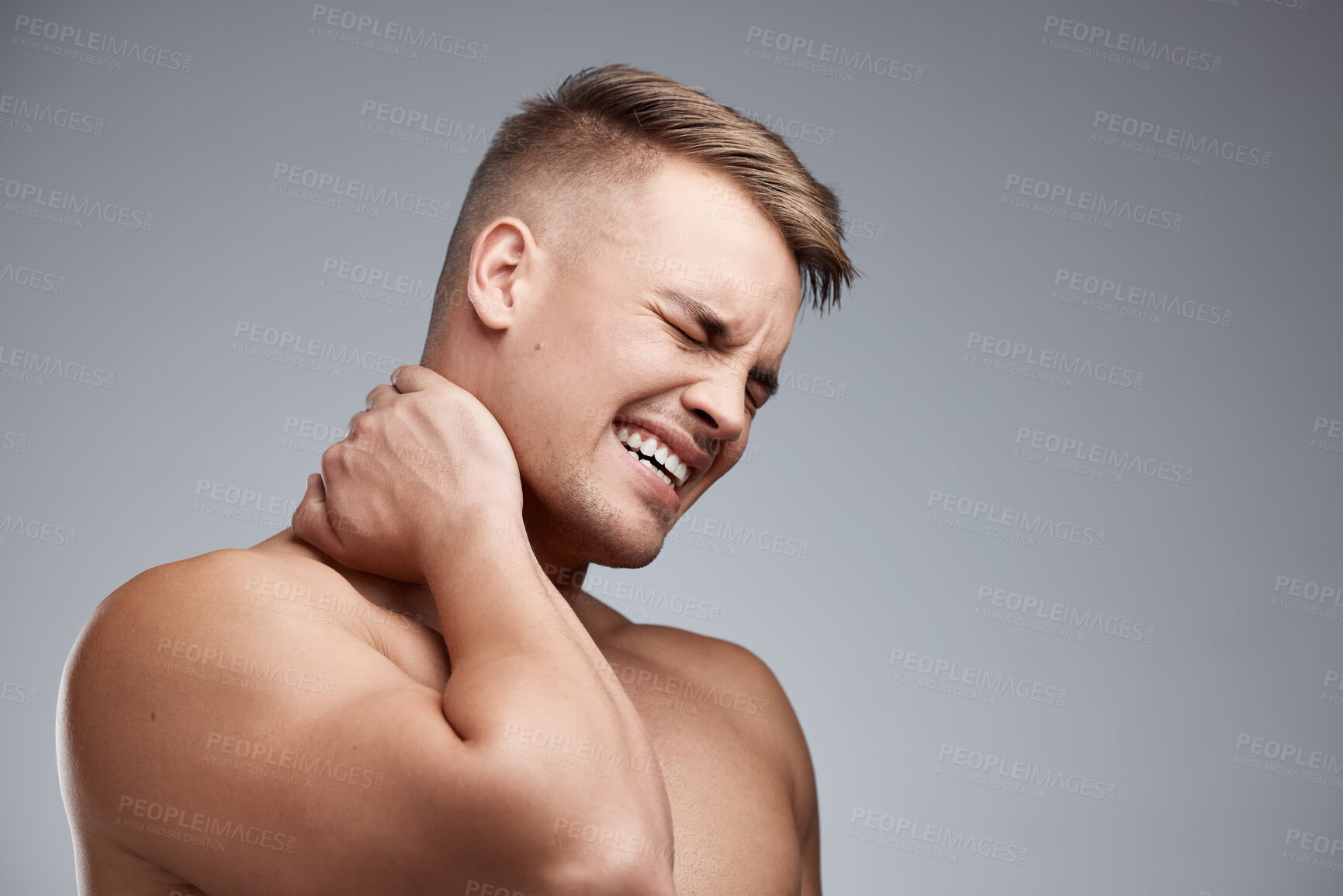 Buy stock photo Studio, neck pain and man with stress tension or injury of workout, exercise and training session. Mockup, male athlete and muscle crisis with inflammation, sport accident and ache by gray background