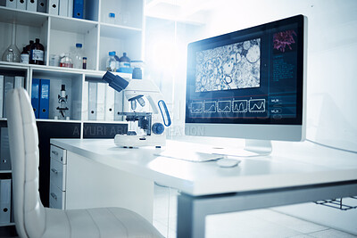 Buy stock photo Shot of a microscope and computer in a modern laboratory