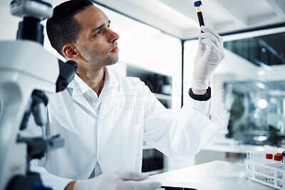 Buy stock photo Man, scientist and analysis of blood sample in test tube, DNA and science experiment in laboratory. Male doctor with gloves, study liquid with forensics, scientific innovation and medical research