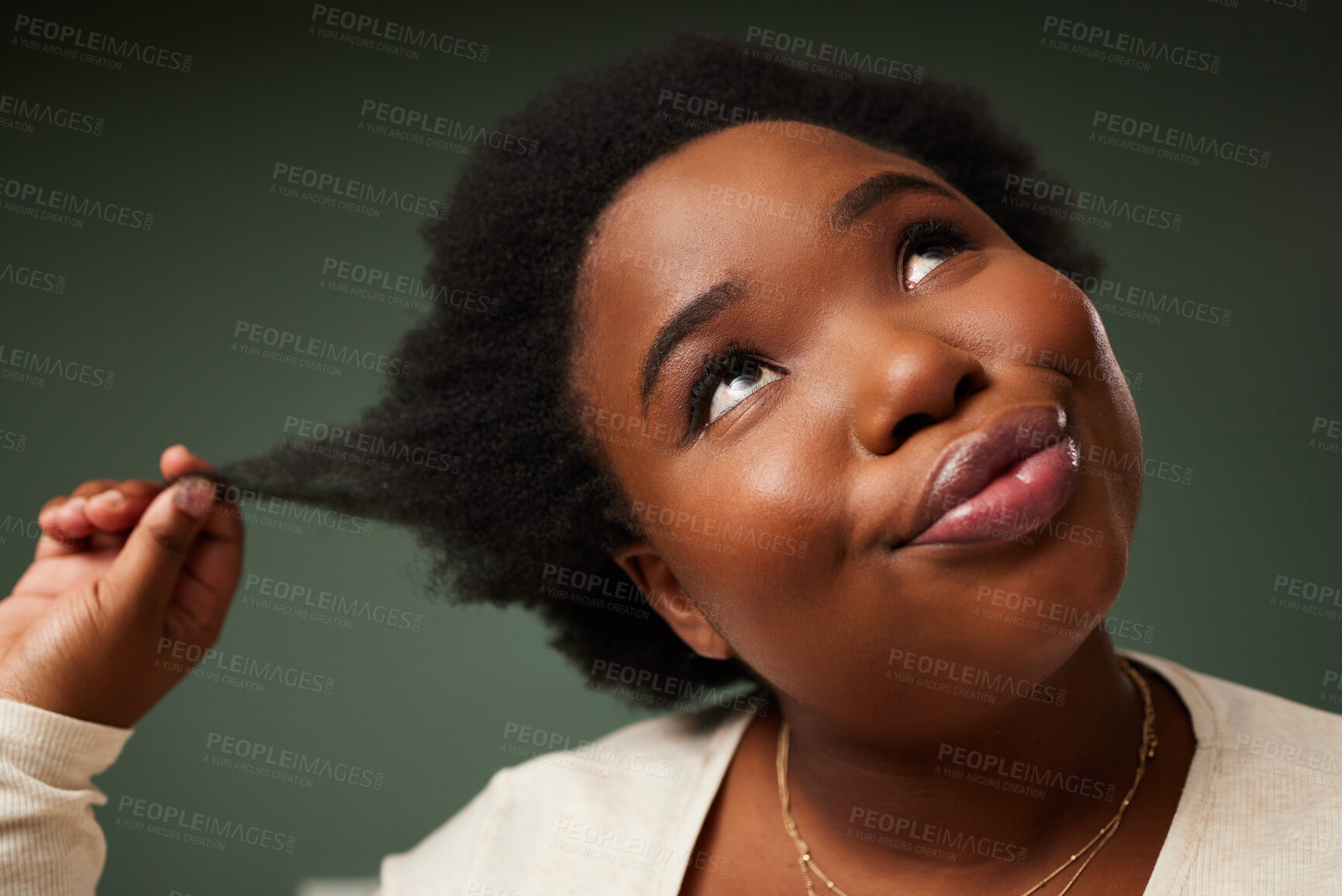 Buy stock photo Black woman thinking in studio about hair treatment, afro or skincare with beauty on green background. Face, girl and natural curly style for wellness, soft texture and glowing shine