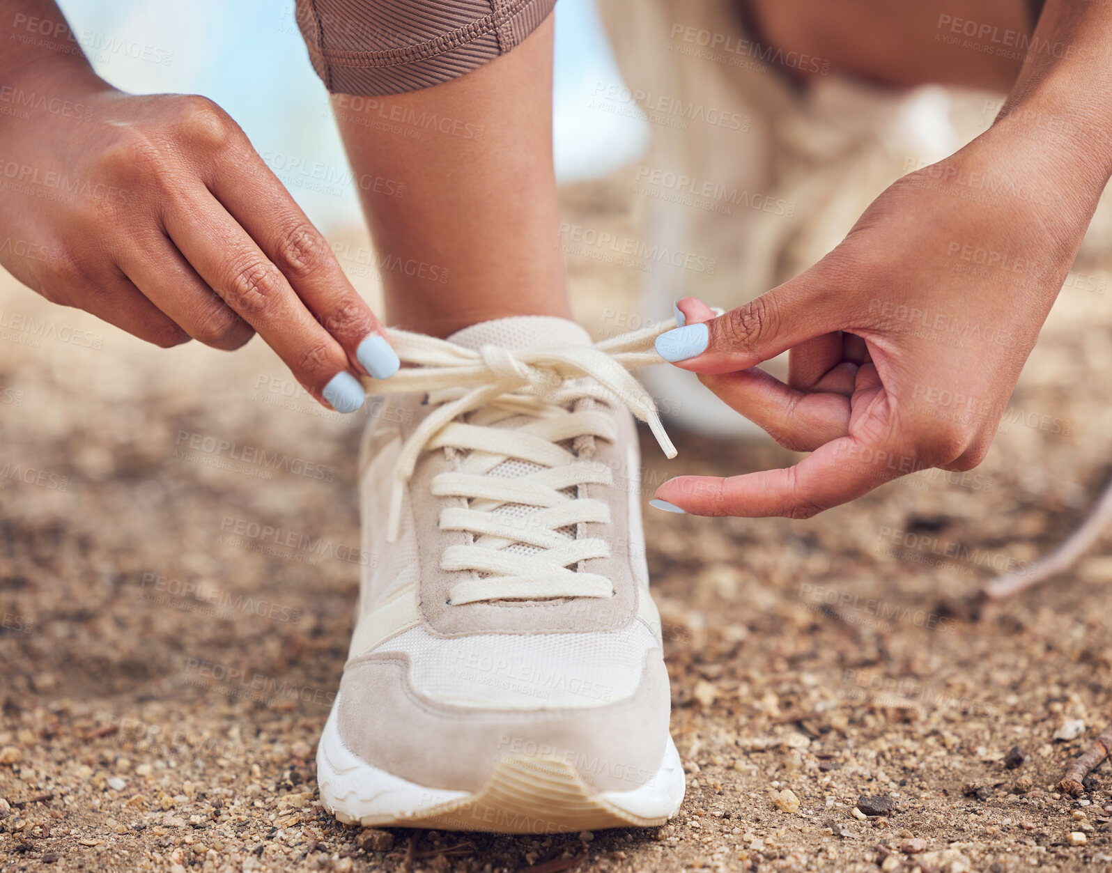 Buy stock photo Exercise, person and hands tie shoes before workout for cardio, running or marathon training. Wellness, feet and legs of runner for prepare, fasten sneakers or ready to start morning jog outdoor