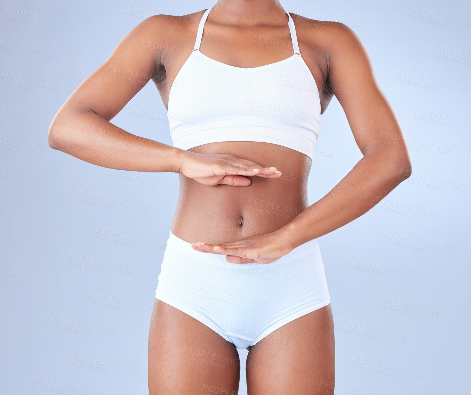 Buy stock photo Woman, stomach and hands to frame for digestion, wellness or gut health in studio background. Cosmetic, liposuction and person closeup in underwear planning diet or tummy tuck with plastic surgery