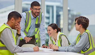 Buy stock photo Cropped shot of a group of young construction workers laughing during a meeting in the boardroom