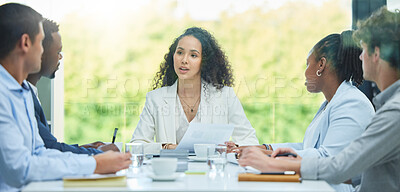 Buy stock photo Shot of a team of staff having a business meeting to plan a project in their office