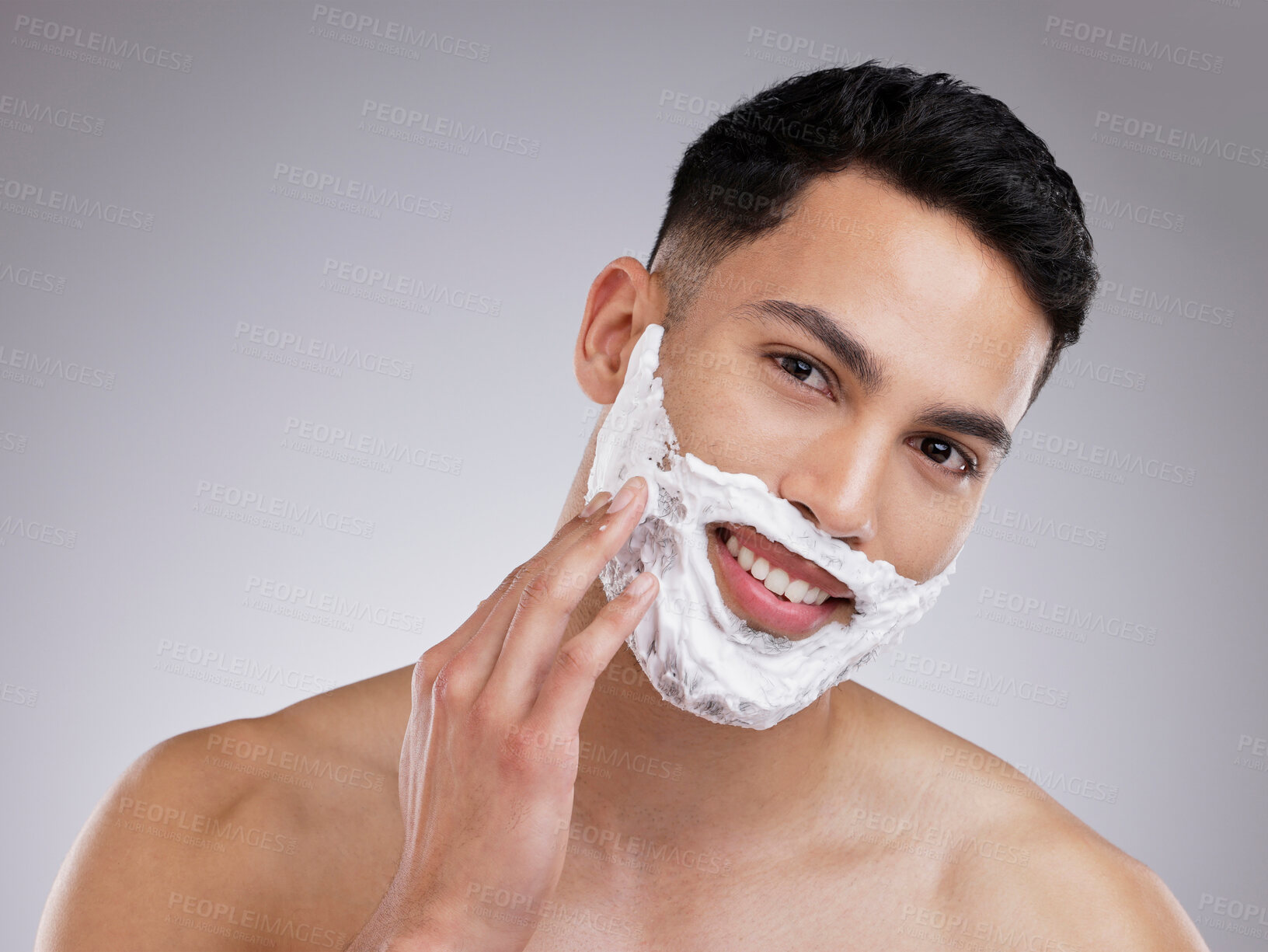 Buy stock photo Happy, shaving and foam with portrait of man in studio for hair removal, grooming and skincare. Cosmetics, self care and morning with face of male model on gray background for cleaning and product