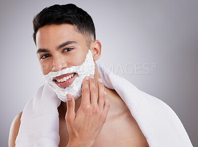 Buy stock photo Beauty, shaving and foam with portrait of man in studio for hair removal, grooming and skincare. Cosmetics, self care and shaver cream with face of model on gray background for cleaning and product