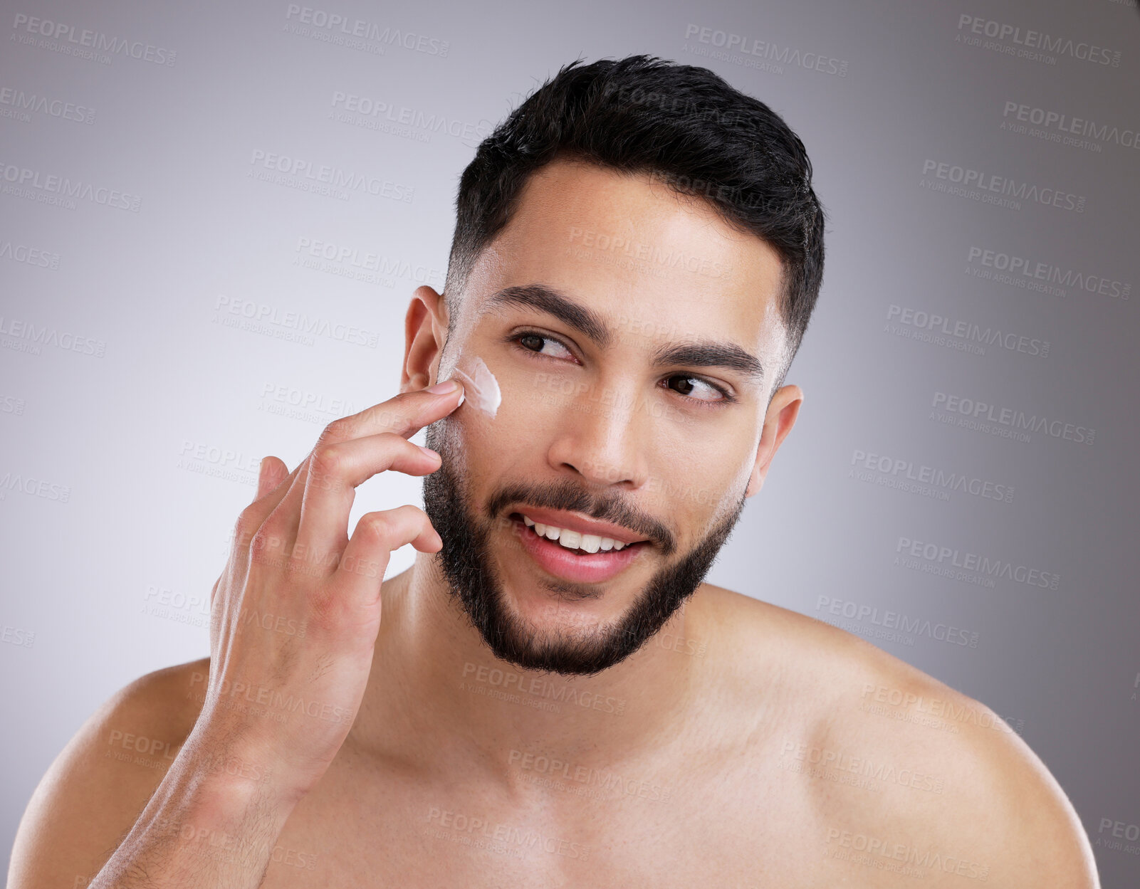 Buy stock photo Studio, face and man with cream for skincare and confidence, morning routine and grooming. Cosmetics, facial health and happy male model with dermatology, care and lotion for skin on grey background