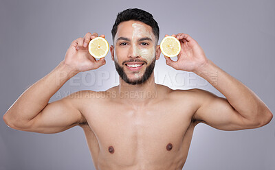 Buy stock photo Skincare, portrait and man with lemon mask, confidence and vitamin c treatment in studio. Cosmetics, facial health and happy male model with fruit detox, dermatology or grooming on white background