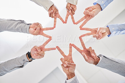 Buy stock photo Shot of a group of unrecognizable businesspeople joining their hands against a white background