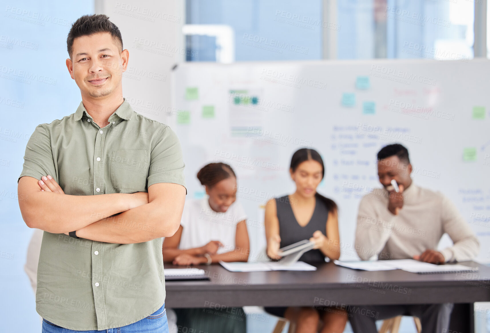 Buy stock photo Man, portrait and arms crossed in office, presentation and happy with confidence, pride or leadership. Entrepreneur, business owner and smile with group in boardroom for workshop at creative agency