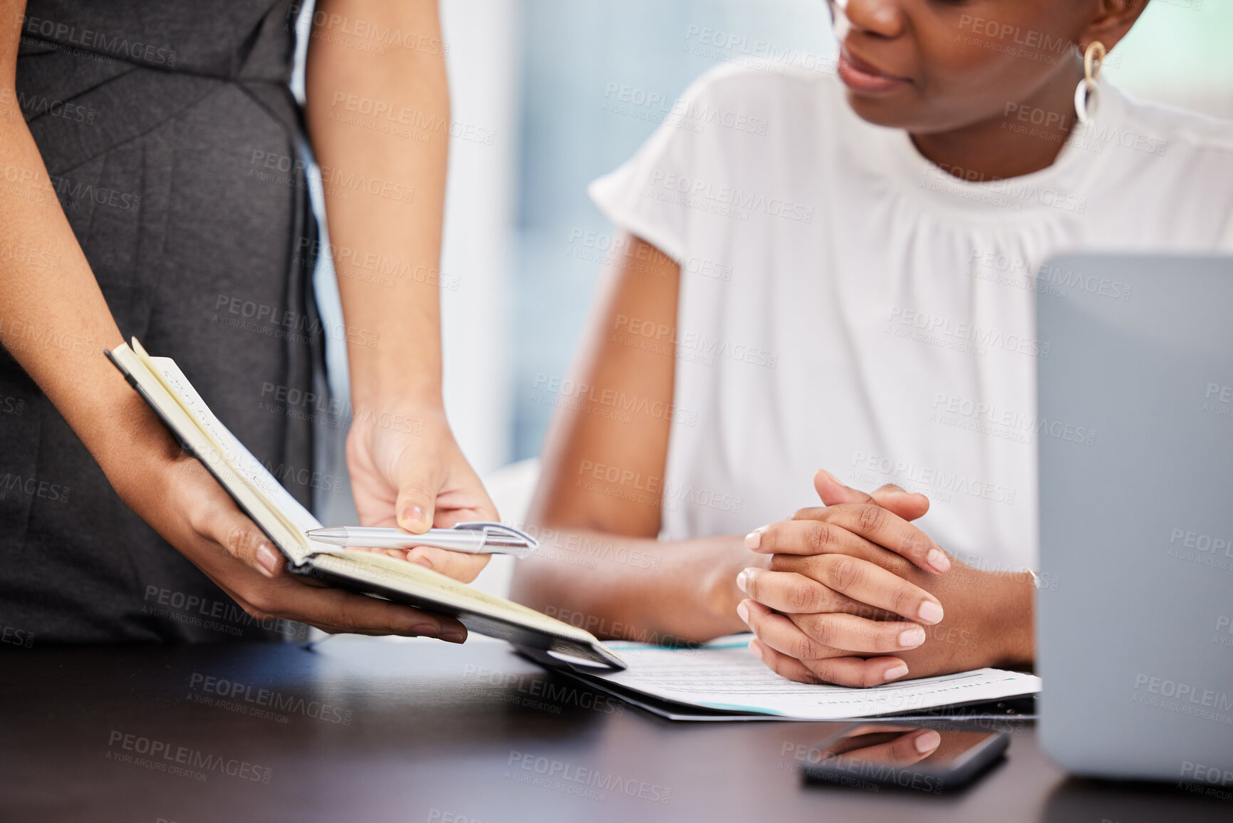 Buy stock photo Planning, notebook and hands of business people schedule teamwork conversation with collaboration in office. Calendar, reminder and employees with review of project info, planner or talk at desk