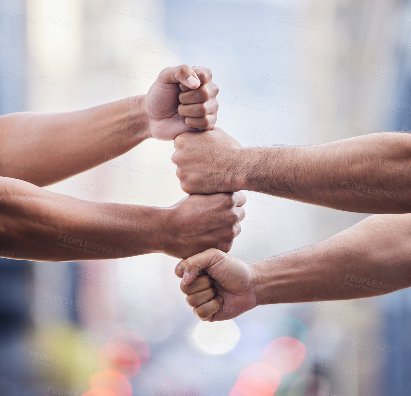 Buy stock photo Cropped shot of two unrecognisable businessmen standing together with their fists stacked