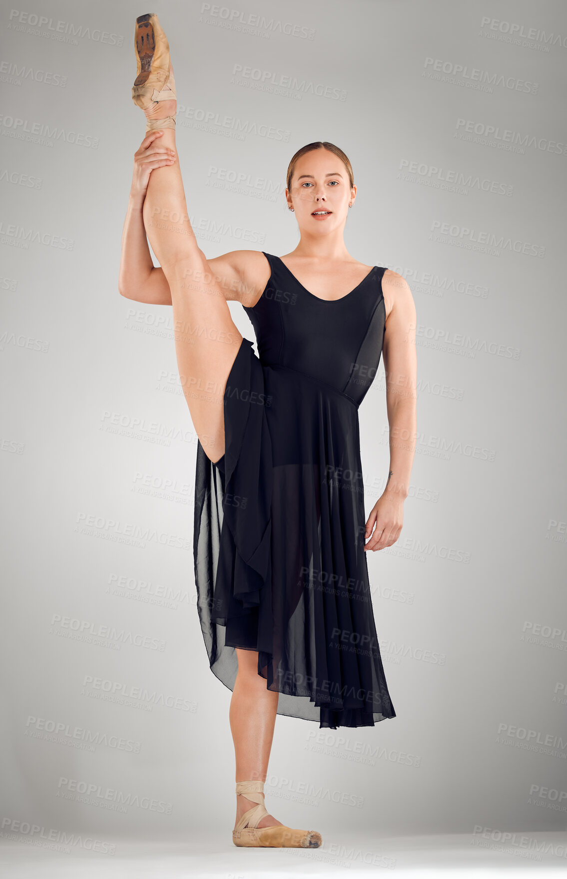 Buy stock photo Balance, stretching and ballet portrait of woman in studio for dancing, sport and pride for recital. Ballerina, talent and artist for elegance, training and competition in theatre by white background